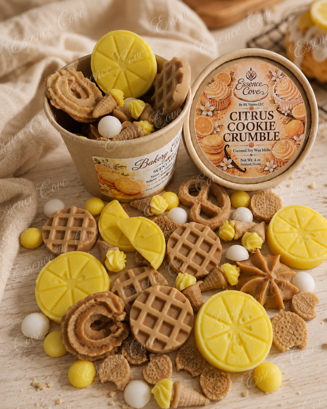 Citrus Cookie Crumble dessert-themed wax melts shaped like mini waffles, pretzels, cookies, and lemons arranged around a product container by Essence Cove