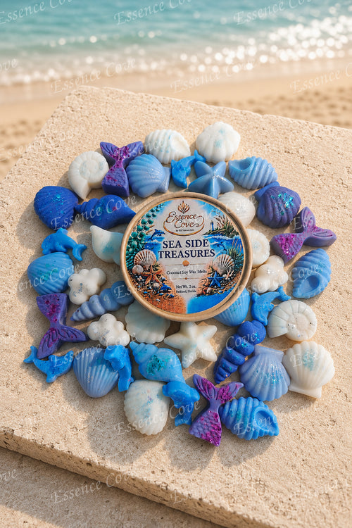 Sea Side Treasures coastal-themed shimmering wax melts shaped like seashells and starfish on a sandy beach background by Essence Cove.